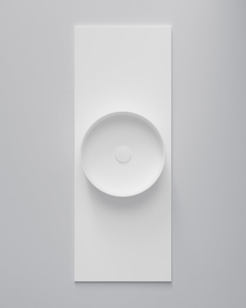 Tvättställ Soak i Soft White solid surface på bänkskiva Flow Soft White (bänkskiva säljs separat). Bild: INR