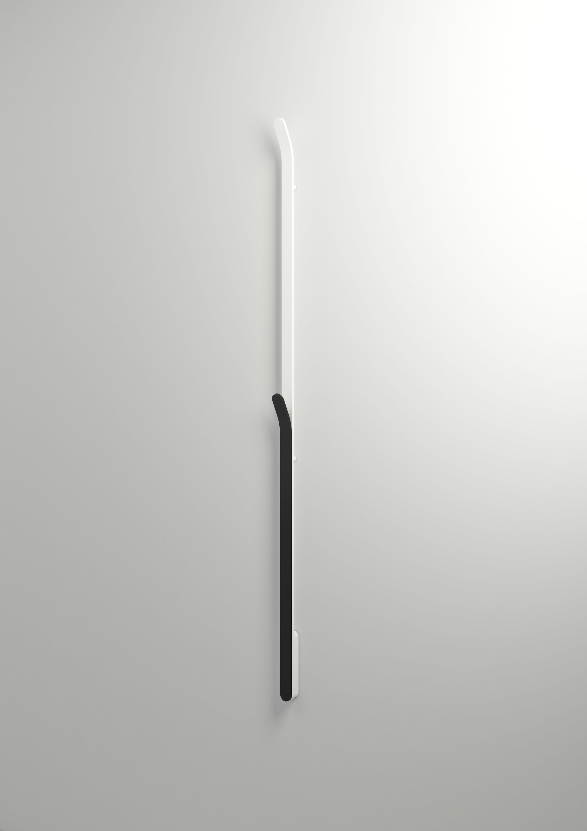 INR Handdukstork Bow i Matte White / Brushed Black (art.nr 80000850). Bild: INR